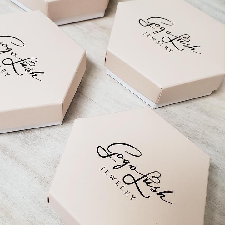 https://packmojo.com/blog/images/2021/03/go-go-lush-script-font-on-rigid-box-packaging.jpg