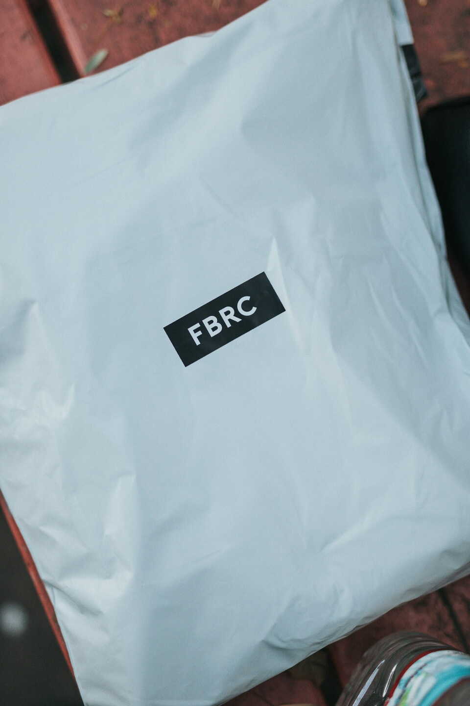 White polymailer with logo