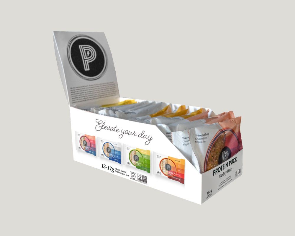 https://packmojo.com/cms_assets/protein_puck_custom_display_box_auto_bottom_845792e527.jpg